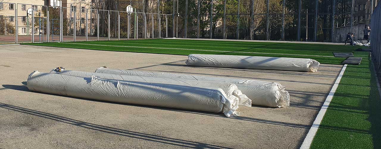 Укладка и доставка искусственной травы - Строительство спортивных площадок